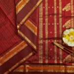Arakku Maroon Kanjivaram Silk Cotton Saree with a Deep Brown Border