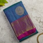 Peacock Blue Kanjivaram Silk Saree with Gold Medallion